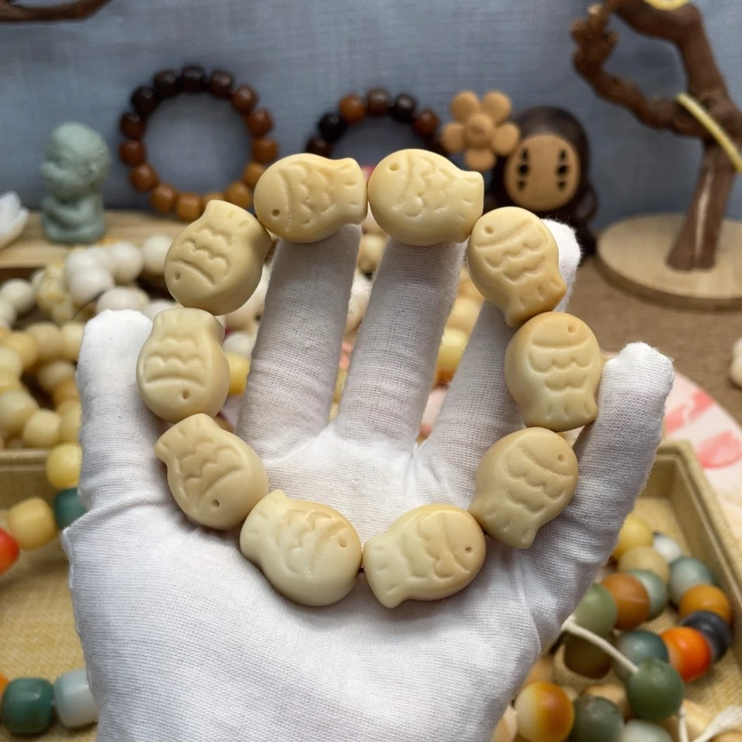 菩提根/象牙果吊坠25干磨瑕疵牙果鱼963