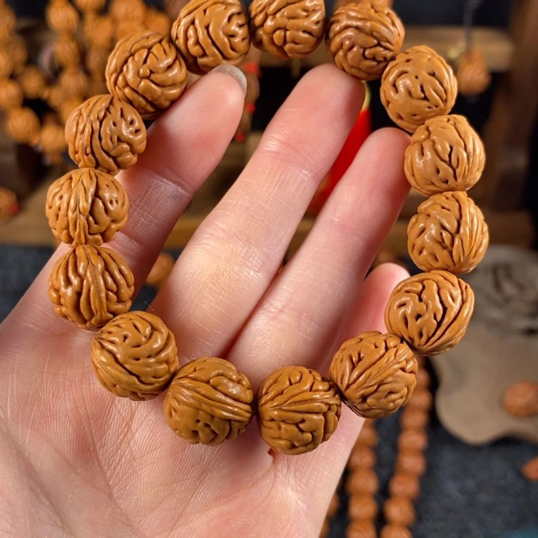 吊坠桃核桃枭手串