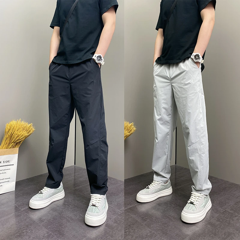 2025年夏季薄款潮流韩版痞帅修身青年男士休闲纯色休闲ins长裤子