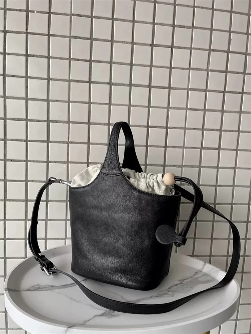 22109小众植鞣头层牛皮复古菜篮子水桶包