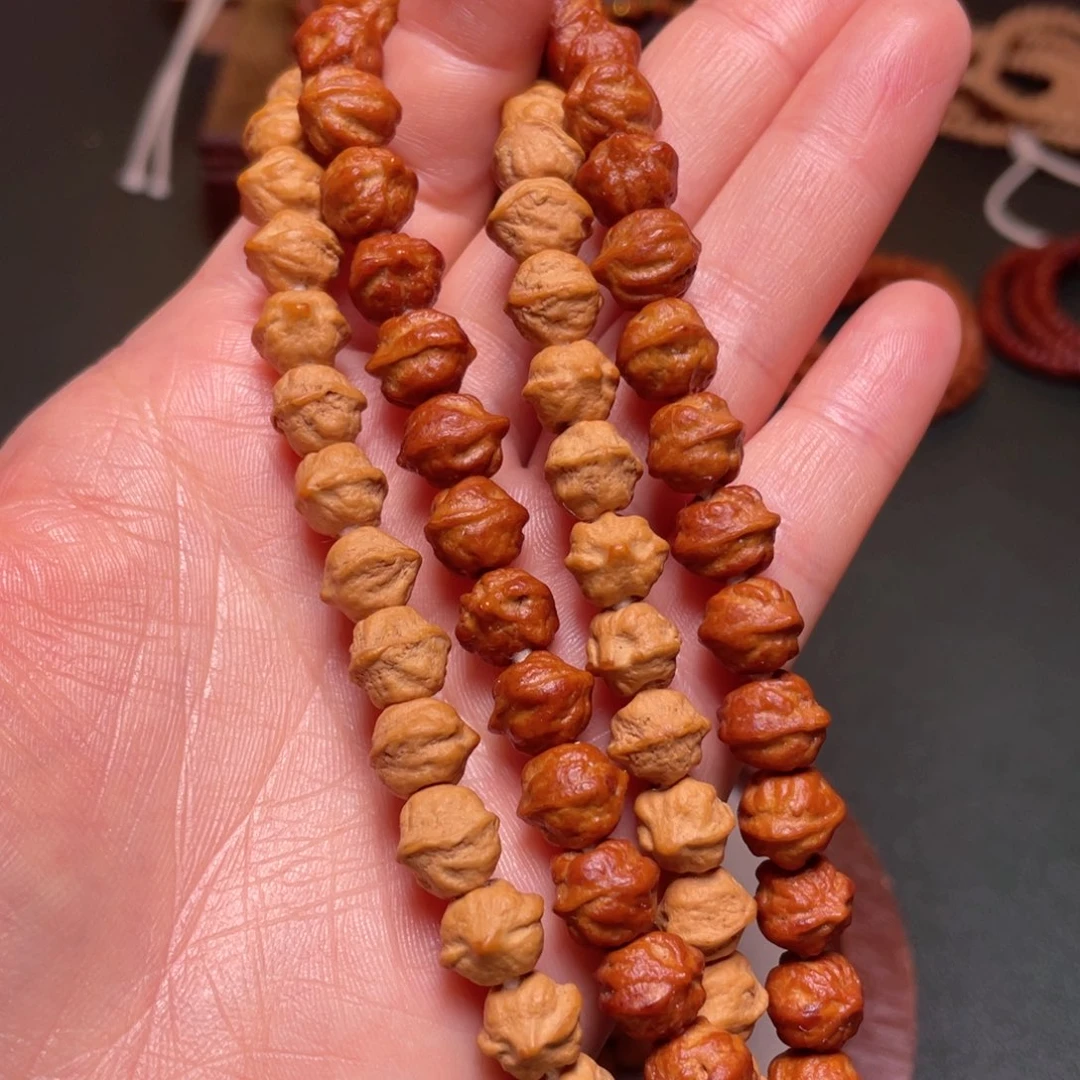 柏香籽/百香籽吊坠白牙横打手持