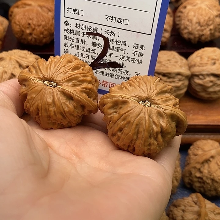 假***乎桃核吊坠铁锤狮子头42
