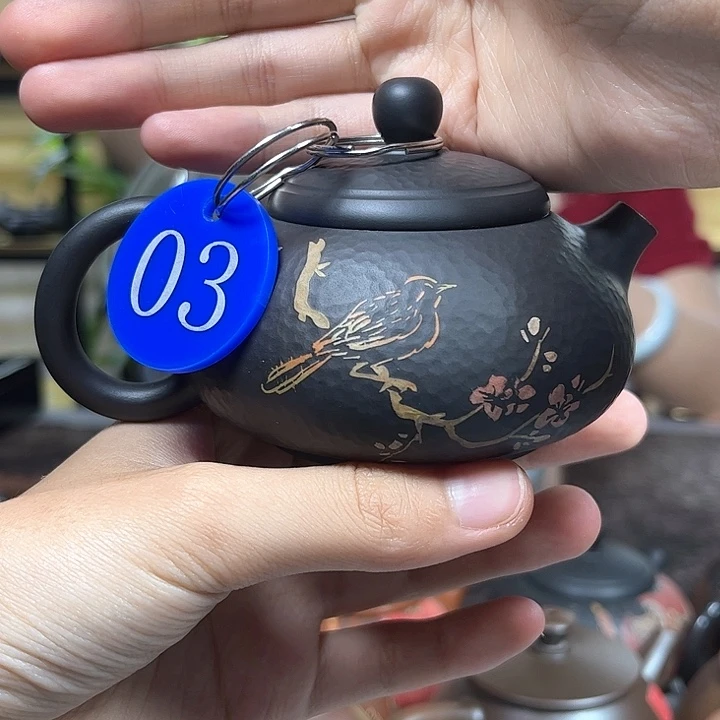 125毫升微微瑕纯手工锤纹刻填胖墩壶
