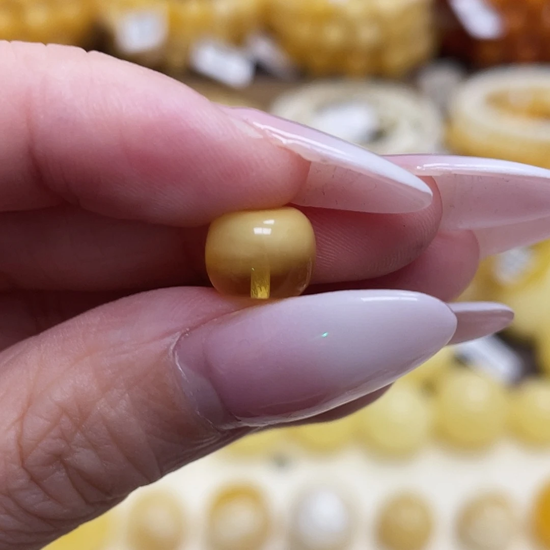 蜜蜡未镶嵌珠宝奇石9.2*7.5mm瑕疵