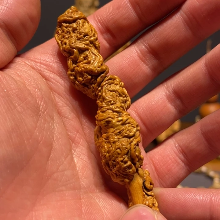 楠木心**花降龙木手把件