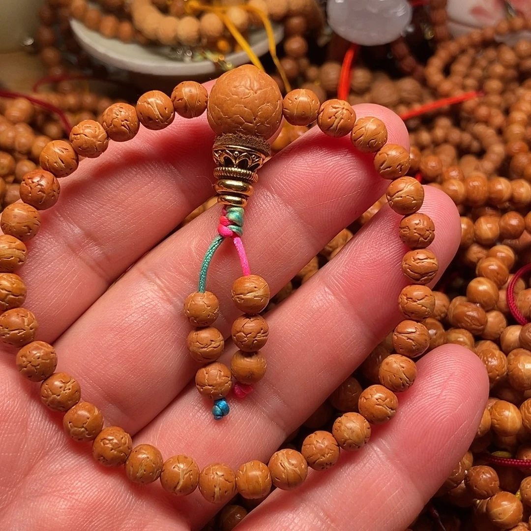 张***润凤眼菩提吊坠酸枣核