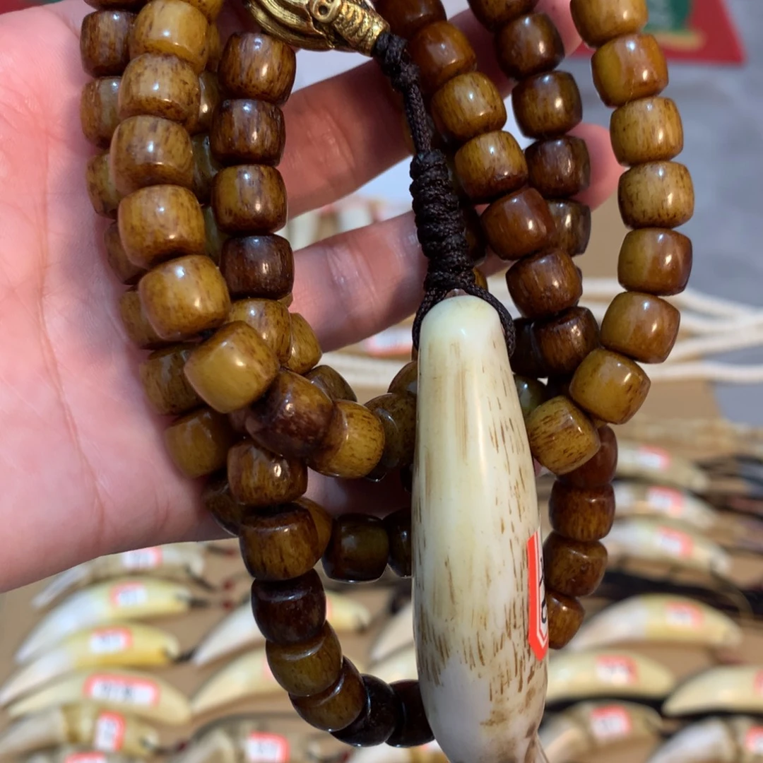 驼骨把件驼骨把件深色链子加9加牙牙