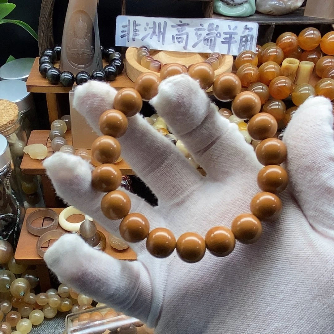 布艺非金属12mm原皮精品猴头手串