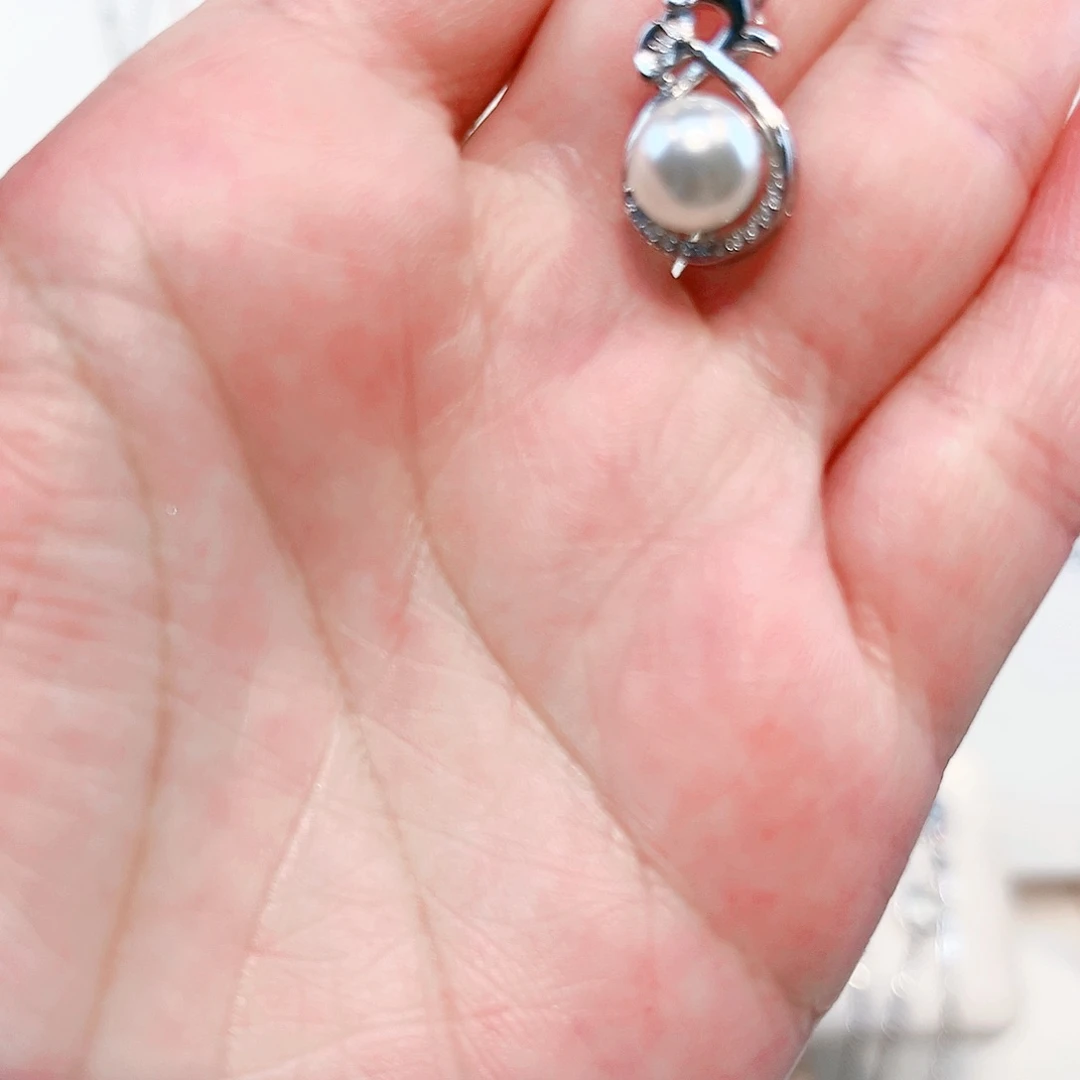 浪***子吊坠(赠链)淡水珍珠足银镶嵌