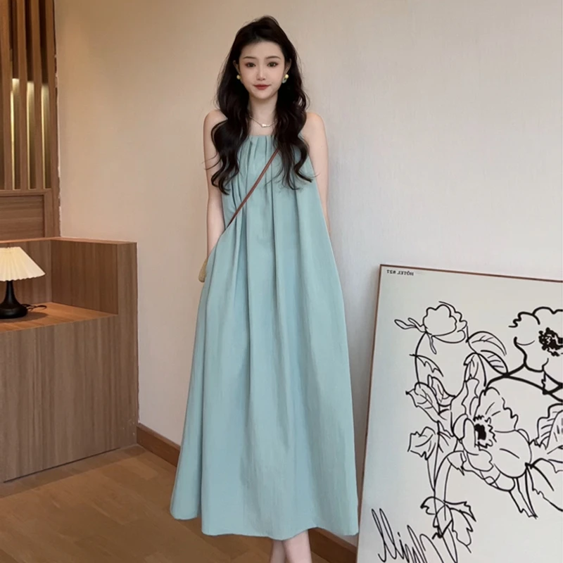 无袖背心连衣裙子女夏季2025新款海边度假高级感挂脖吊带沙滩长裙