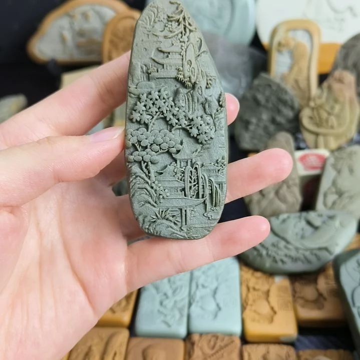 石材山水原石雕刻手把件