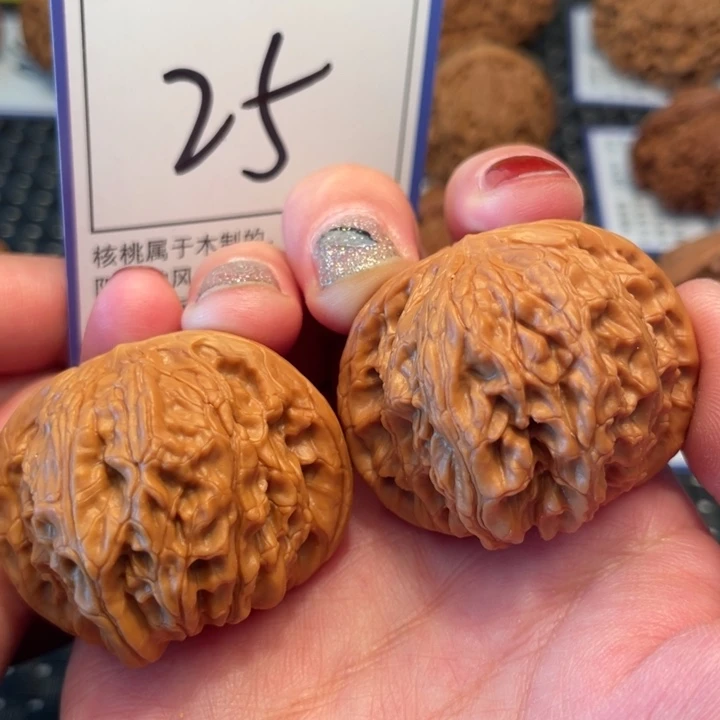 桃核把件40磨盘25。。。