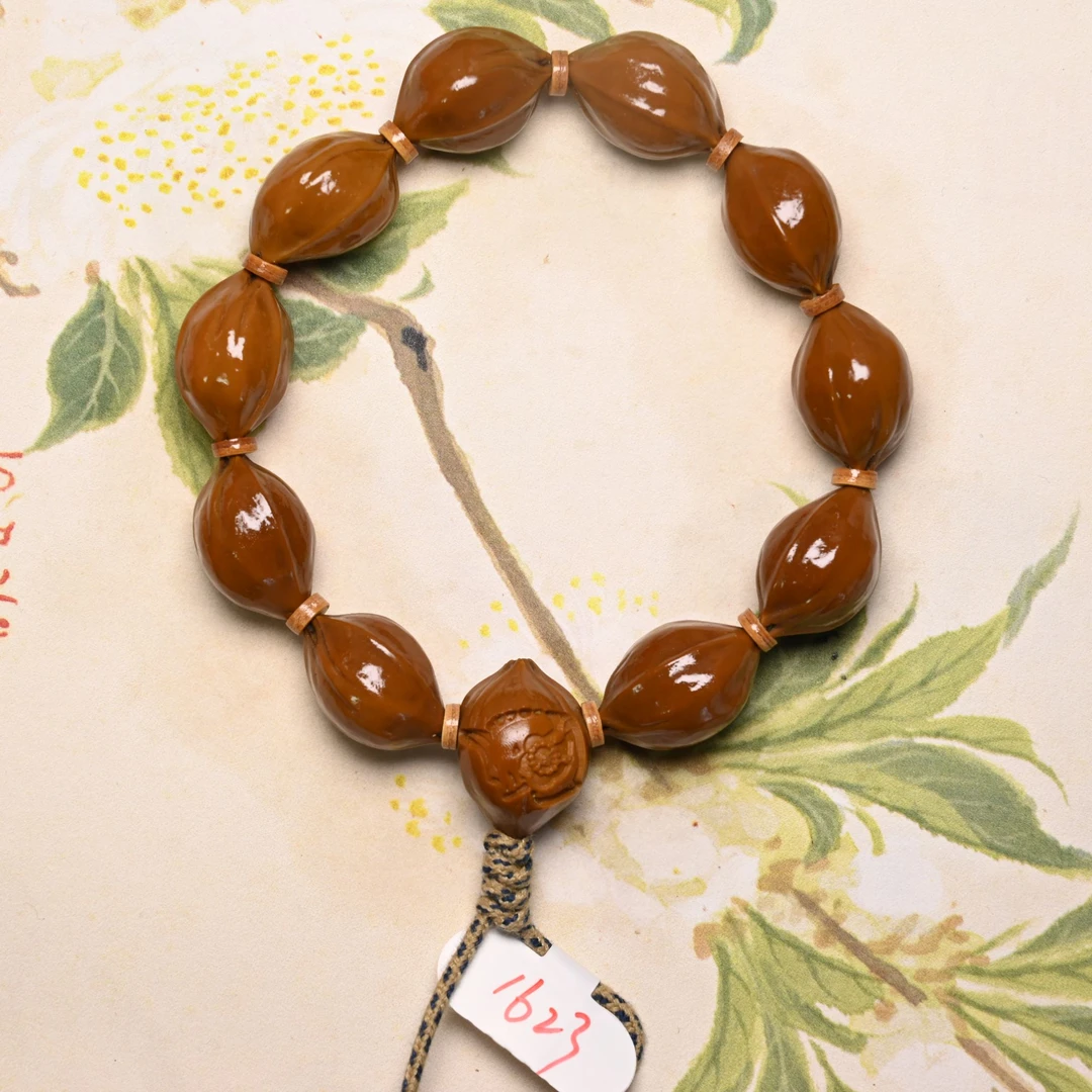 16.23·梅林铁核原生态素串橄榄核树主一手货源 999