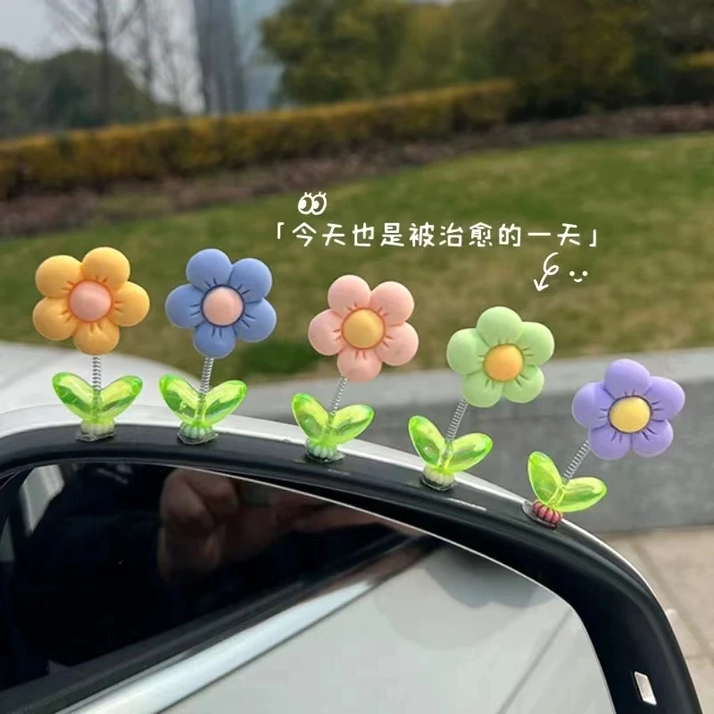 车载小清新可爱饰品摇头小花汽车内饰摆件中控仪表台网红装饰用品