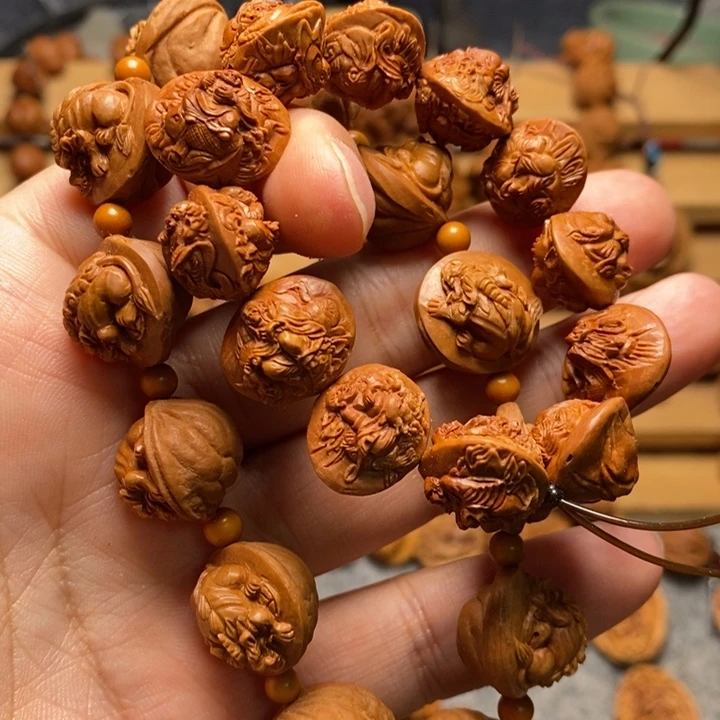 金***开桃核手工雕刻貔貅➕双面骑兽十八罗汉