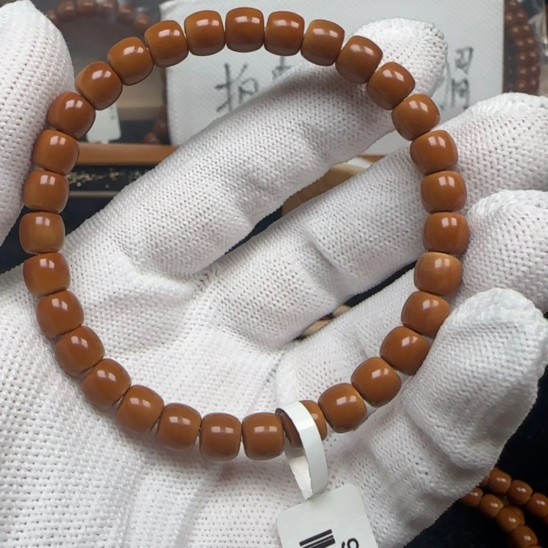 手串橄榄核老挝单圈极限弧三花无白7.2mm