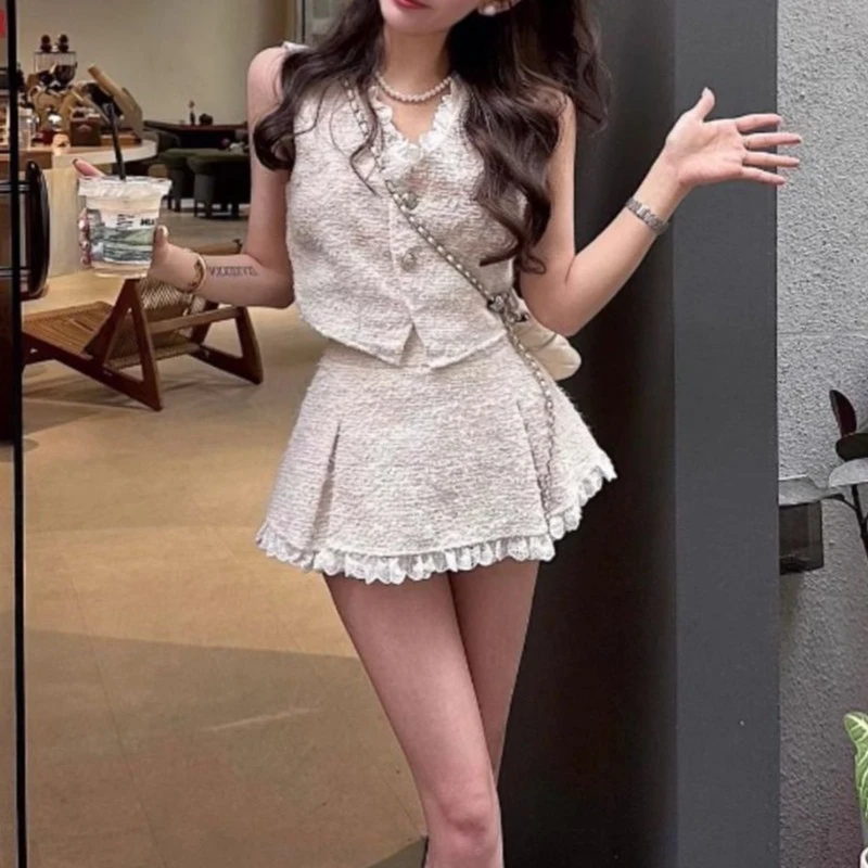 名媛小香风粗花呢套装女夏季新款蕾丝拼接马甲开衫甜辣短裙两件套