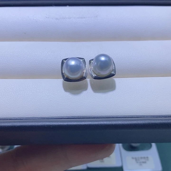 颍***源海水珍珠耳饰银S925镶嵌