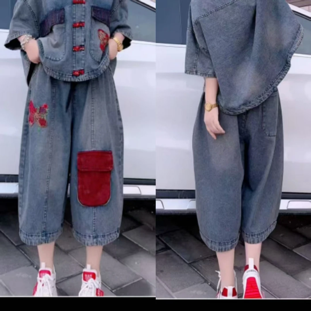 唐汉布依新款女装裤子拼色牛仔D