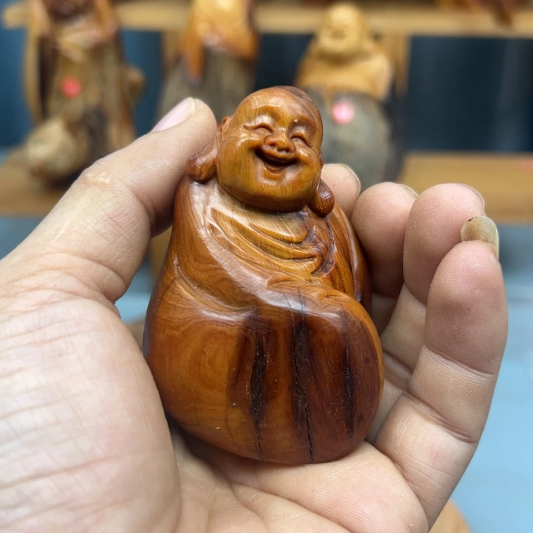 蓝***云木瑕疵崖柏木摆件手把件，