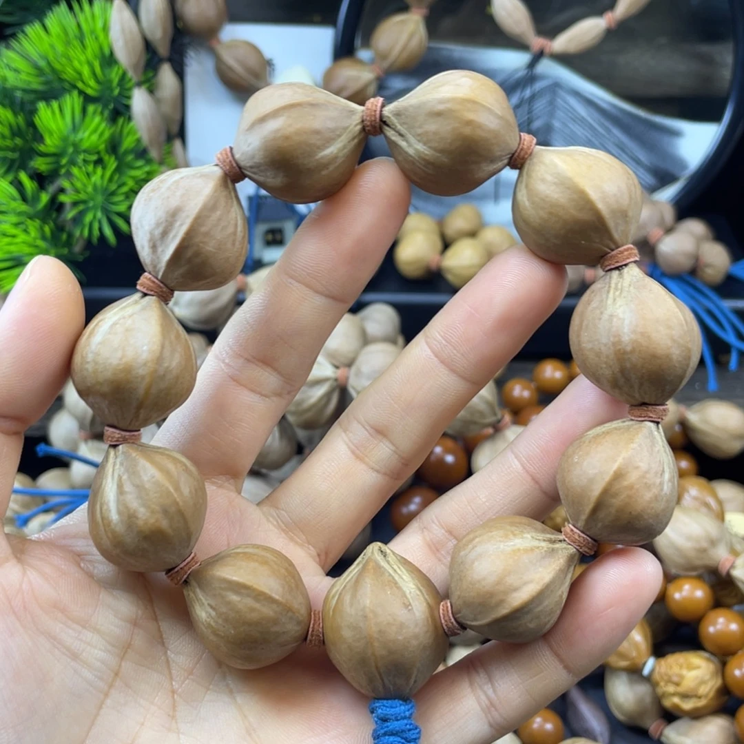 四***已橄榄核吊坠005.22x25