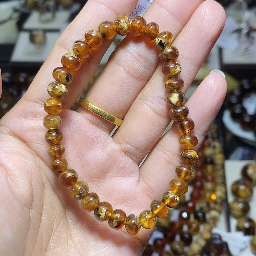 习***习琥珀未镶嵌裸石溶洞6mm