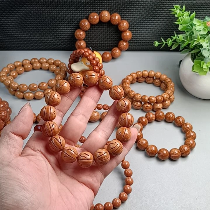桃核手串铁籽密纹黄皮15