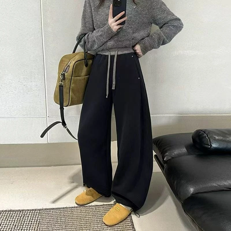 春季上新~潮流版型拼接腰头设计款弯刀抽绳裤 K0568