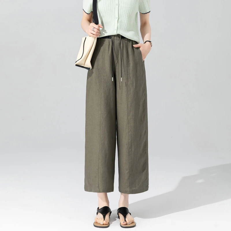 草绿色裤子女夏季薄款高端亚麻女裤松紧腰哈伦裤女2025新款九分裤