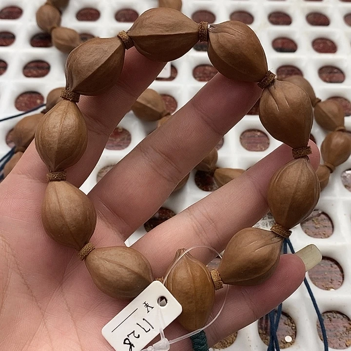 橄榄核吊坠1726三面佛梅林铁核