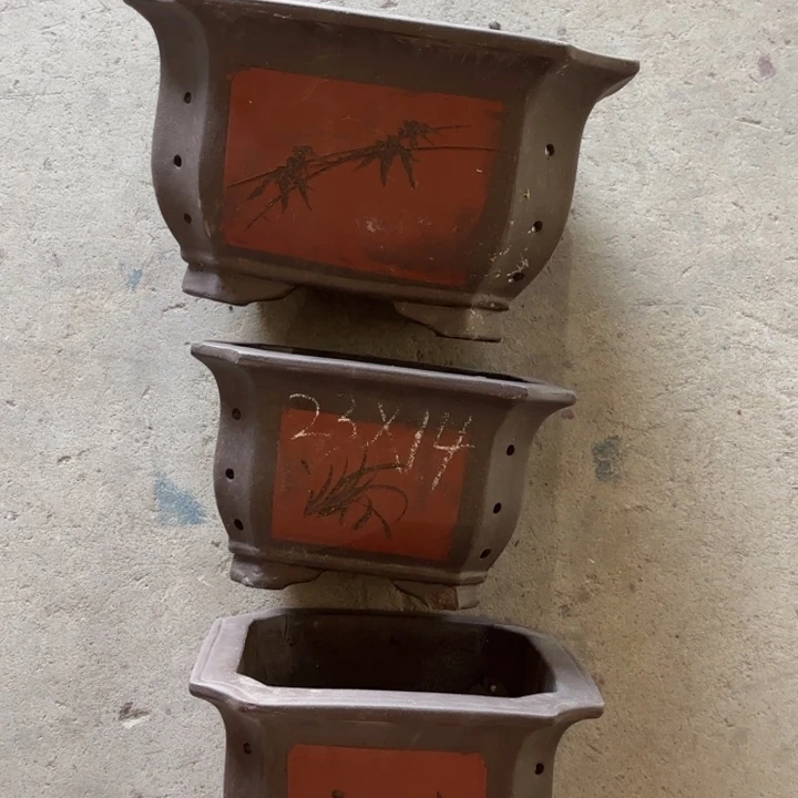 紫砂花盆70-3。       处理