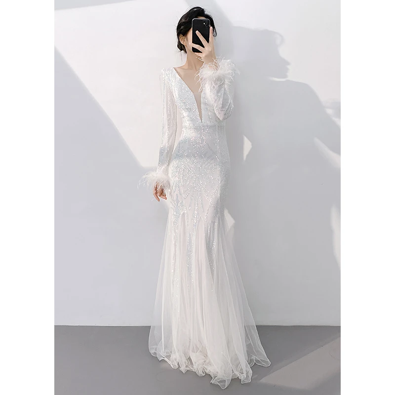 白色晚礼服女高级感气质绝美高端名媛年会主持人鱼尾长袖亮片裙冬