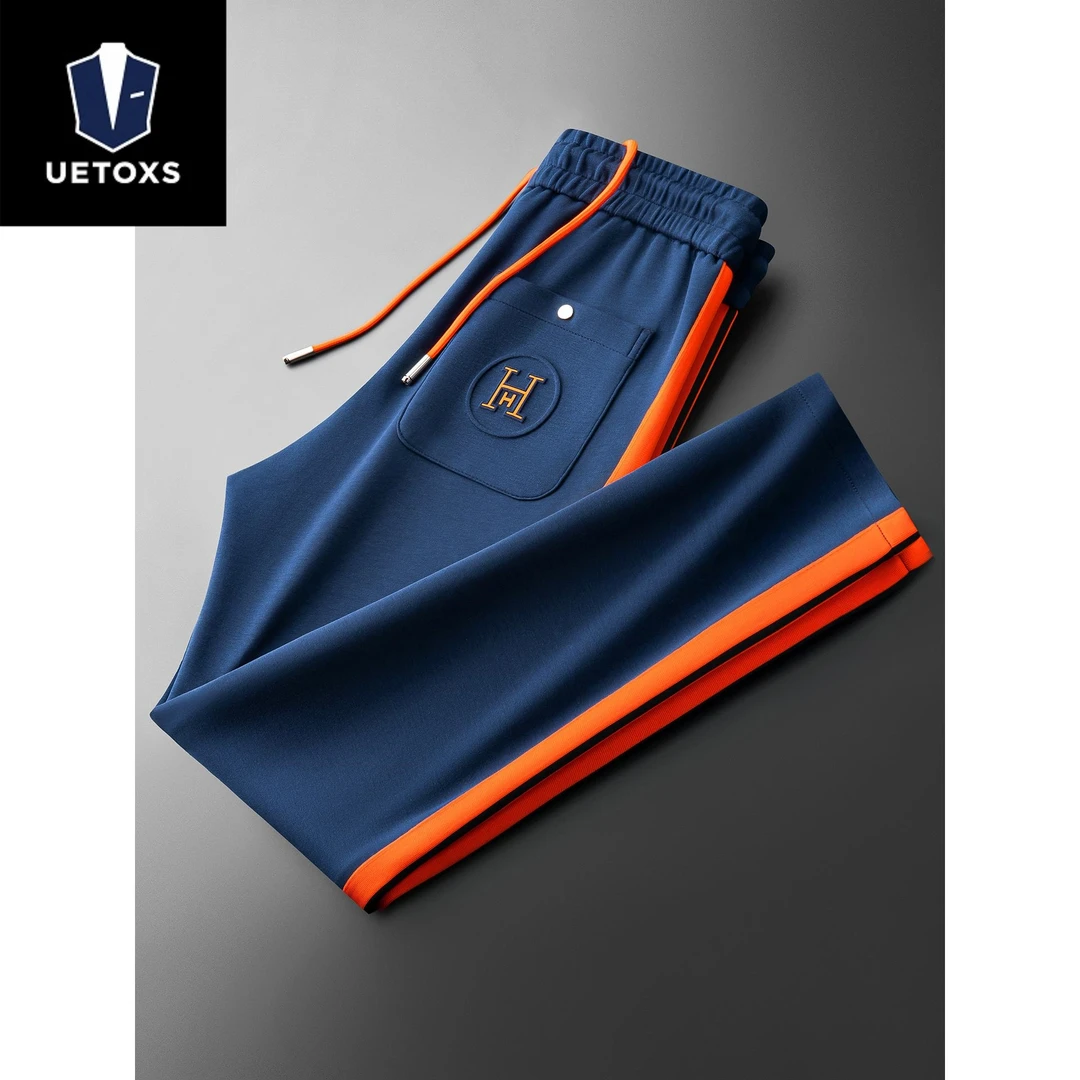 秋季时尚撞色拼接显瘦空气层休闲裤男士高端潮牌运动直筒卫裤男款