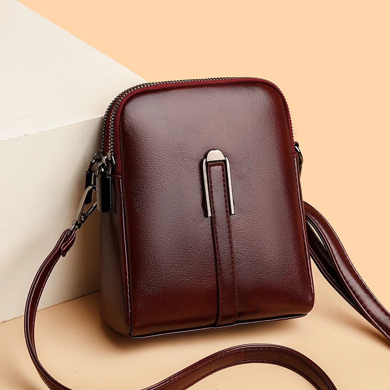 真皮复古单肩方形拉链纯色斜挎包中年女士韩版零钱包简约竖款