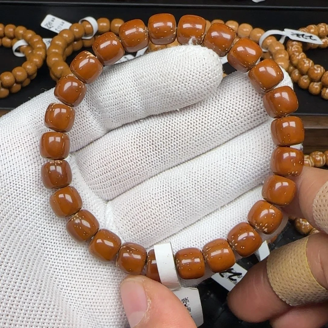 手串紫金鼠9.6mm实心老型（奔驰花眼）骨折价172