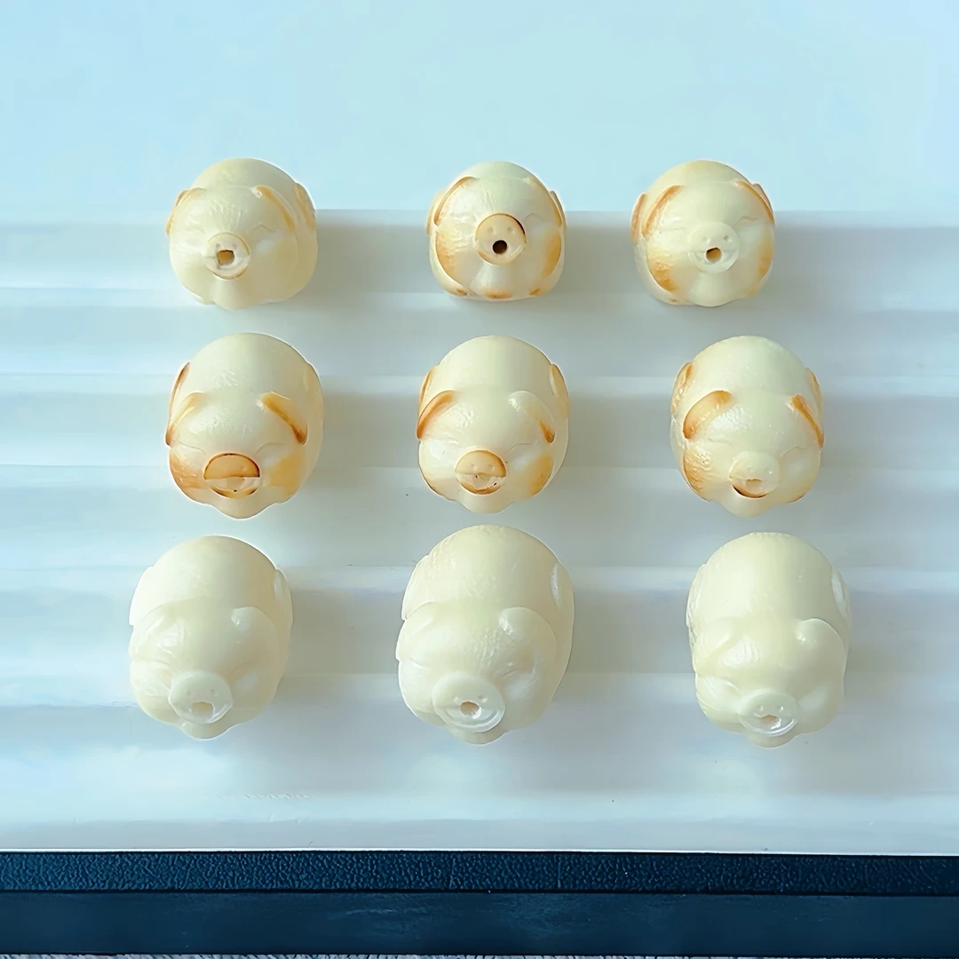 大尺寸牙果雕刻款飞天小猪配饰-象牙果原果精雕创意造型配件-通货