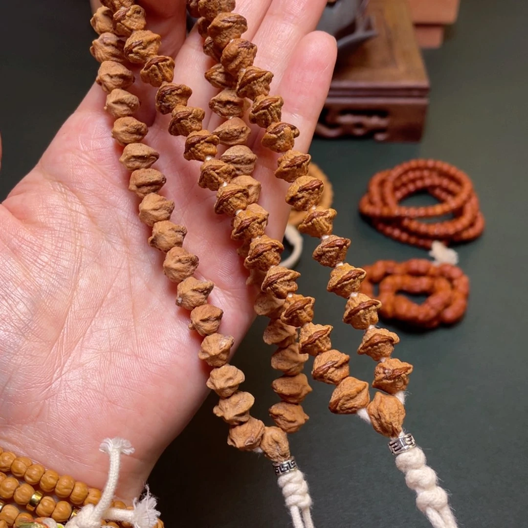 柏香籽/百香籽吊坠红牙牙嘴手持