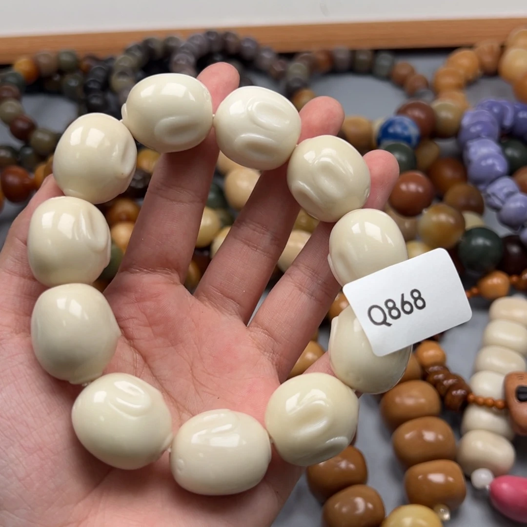 吊坠菩提根/象牙果Q868兔子20-24瑕疵一串
