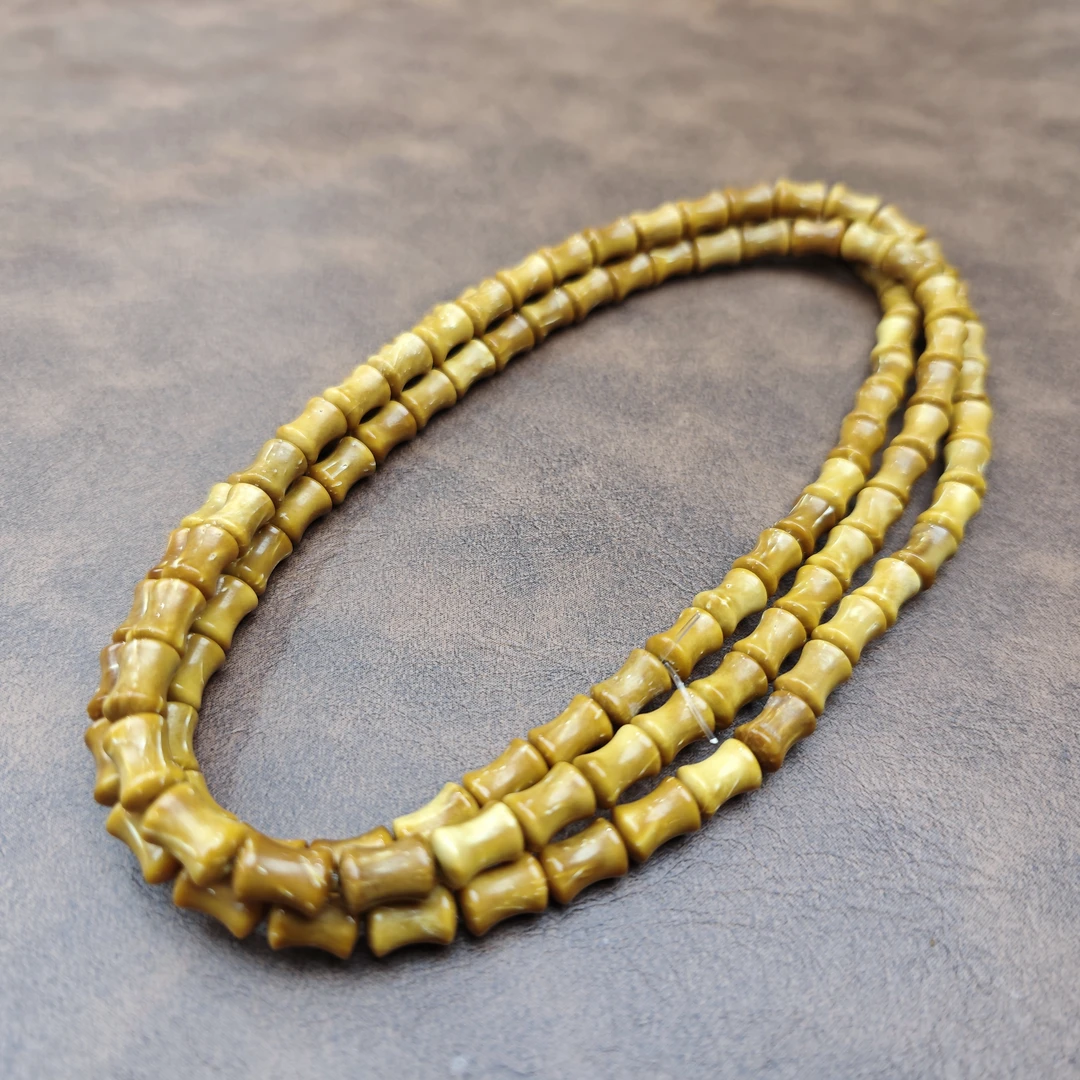 库克黄金甲竹节长串114.二档有棕眼线.无胶磨堵孔