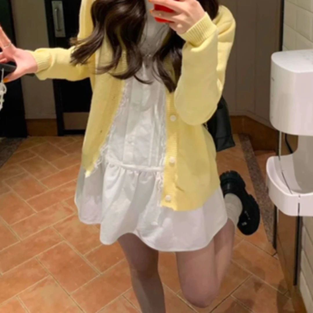 开春新款设计感吊带背心长袖开衫套装女春季超显白针织系列no退换