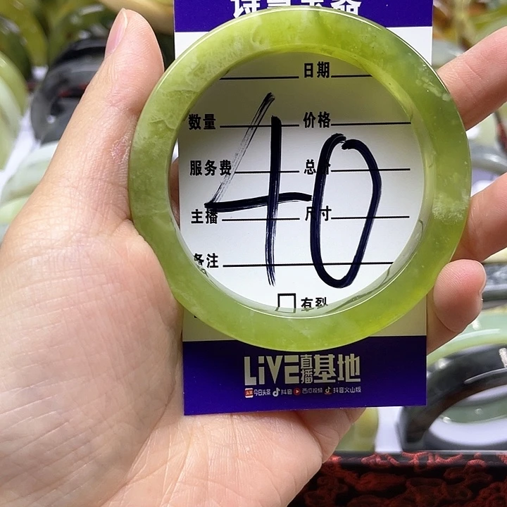 蛇纹石玉手镯合金羡****?