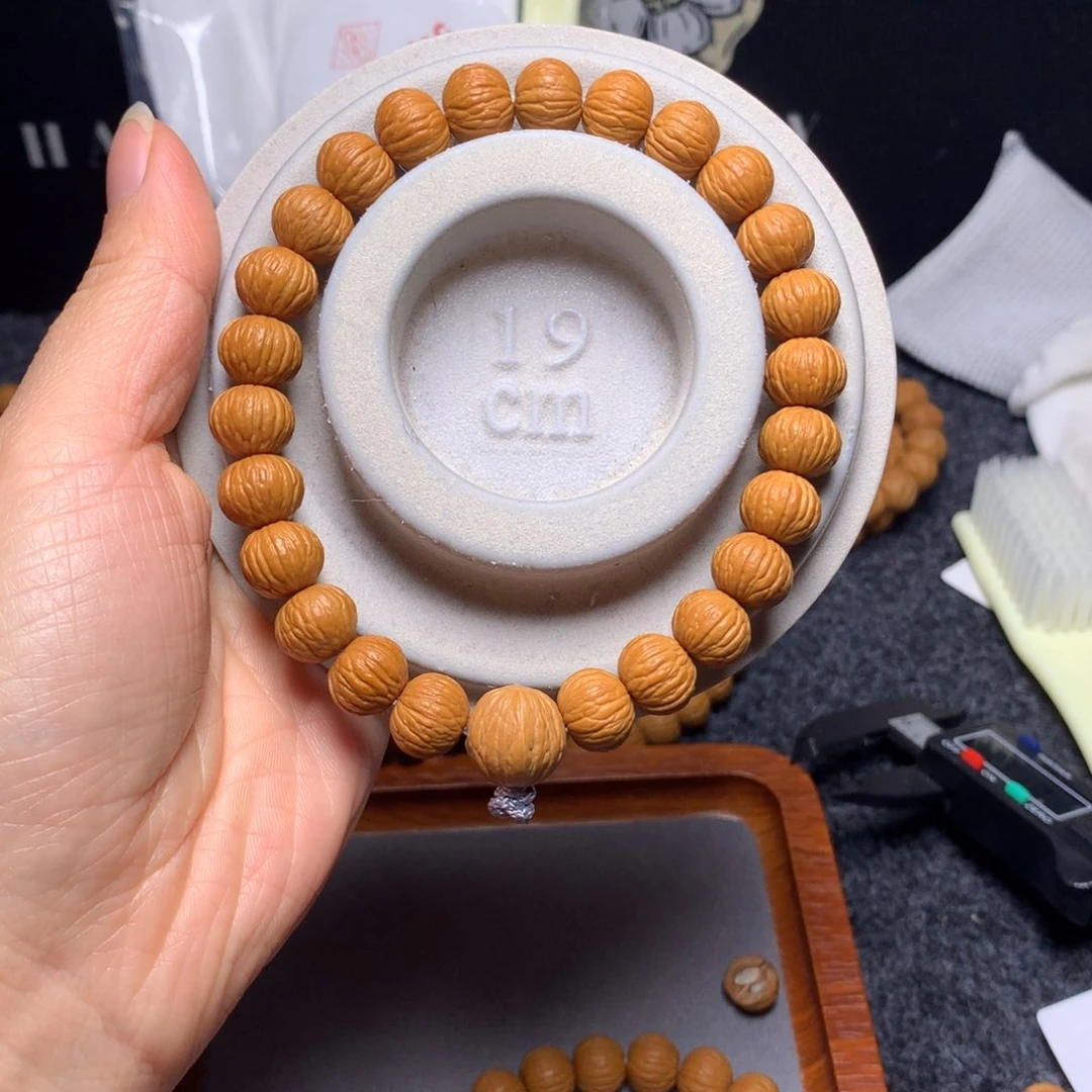 猴头核桃手串小****蜡11➕精修凤羽手持