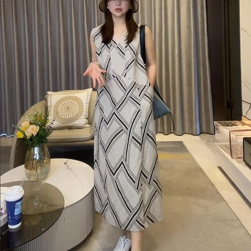 【CAM】2025年夏季新款印花图案V领老钱风不规则连衣裙百搭长裙子女