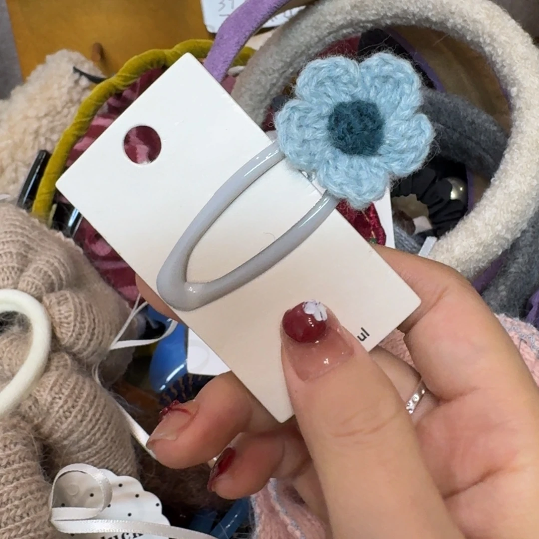 布艺铁合金蓝色花朵拜拜夹