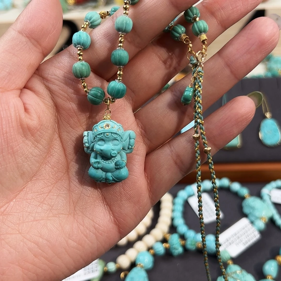 18K金镶嵌绿松石毛衣链象神毛衣链