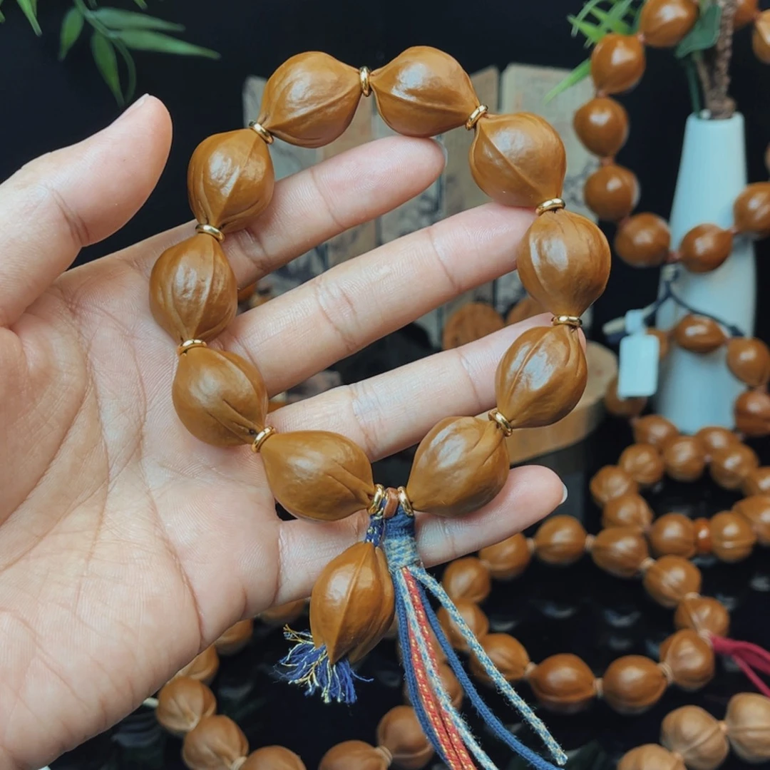 H***。手串/手链橄榄核梅林铁核1925