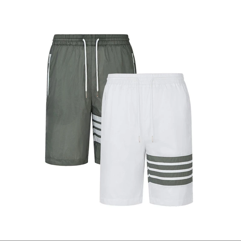 夏季薄款潮牌男士拉链口袋速干裤情侣四分短裤薄款运动休闲沙滩裤