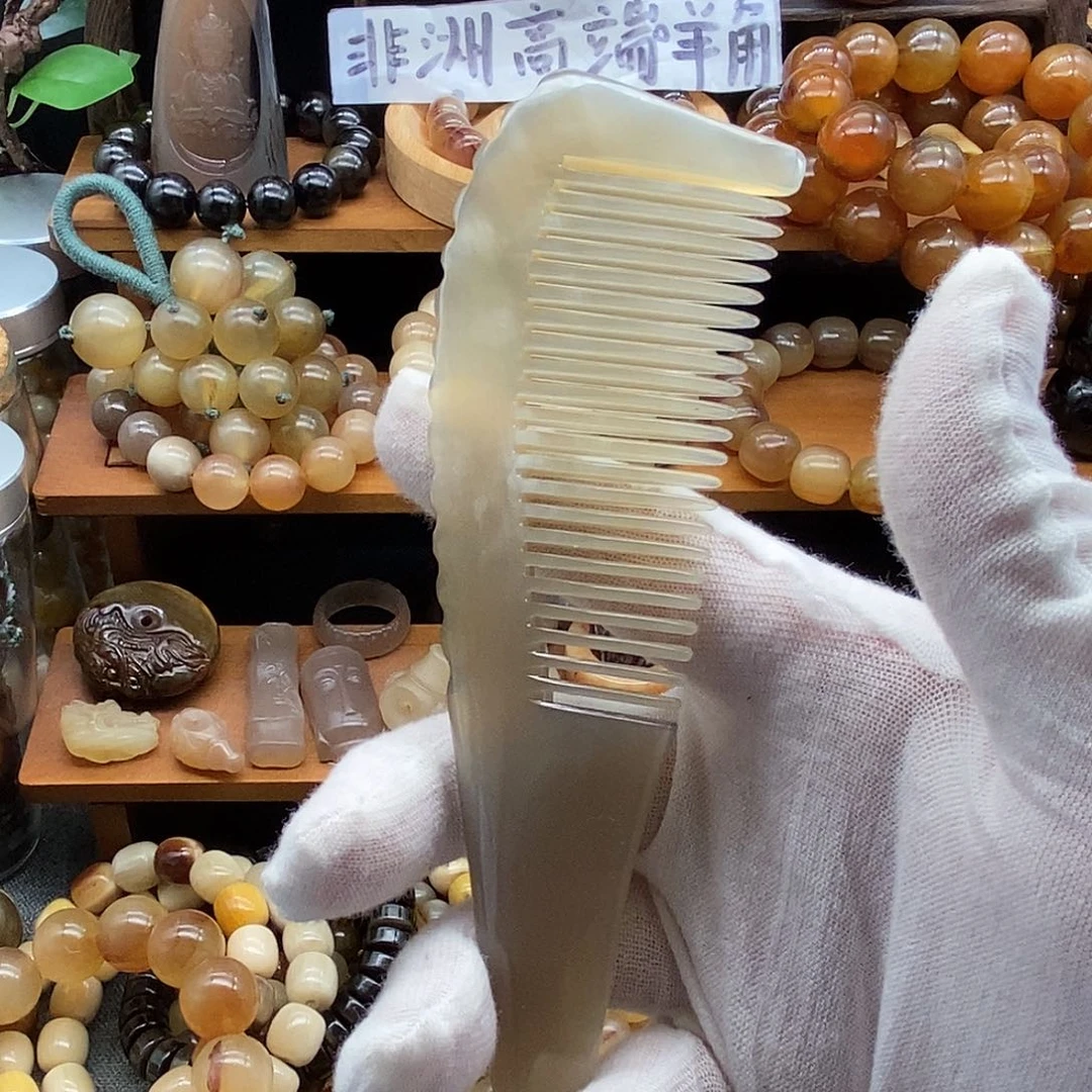 布艺非金属15cm坦桑尼亚白水牛角梳子