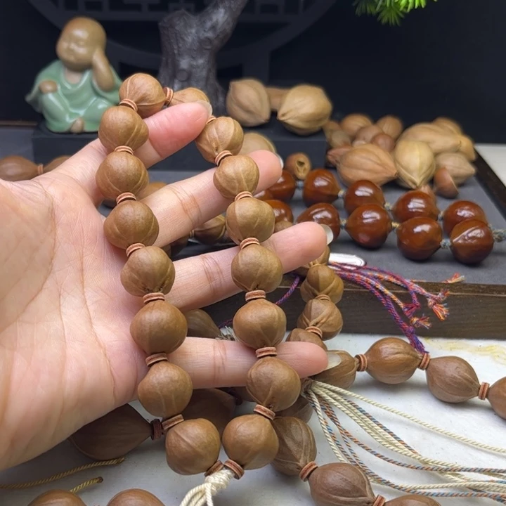 天***2手串/手链橄榄核1.6*1.6原皮三花蒜头铁核
