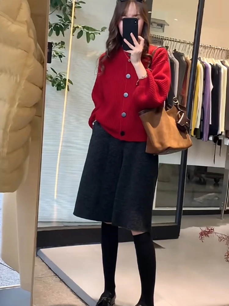 25年秋冬新款单排扣设计感简约针织开衫显瘦百搭气质通勤圆领上衣